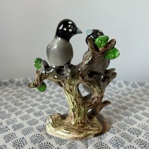 Vintage ceramic birds on a branch